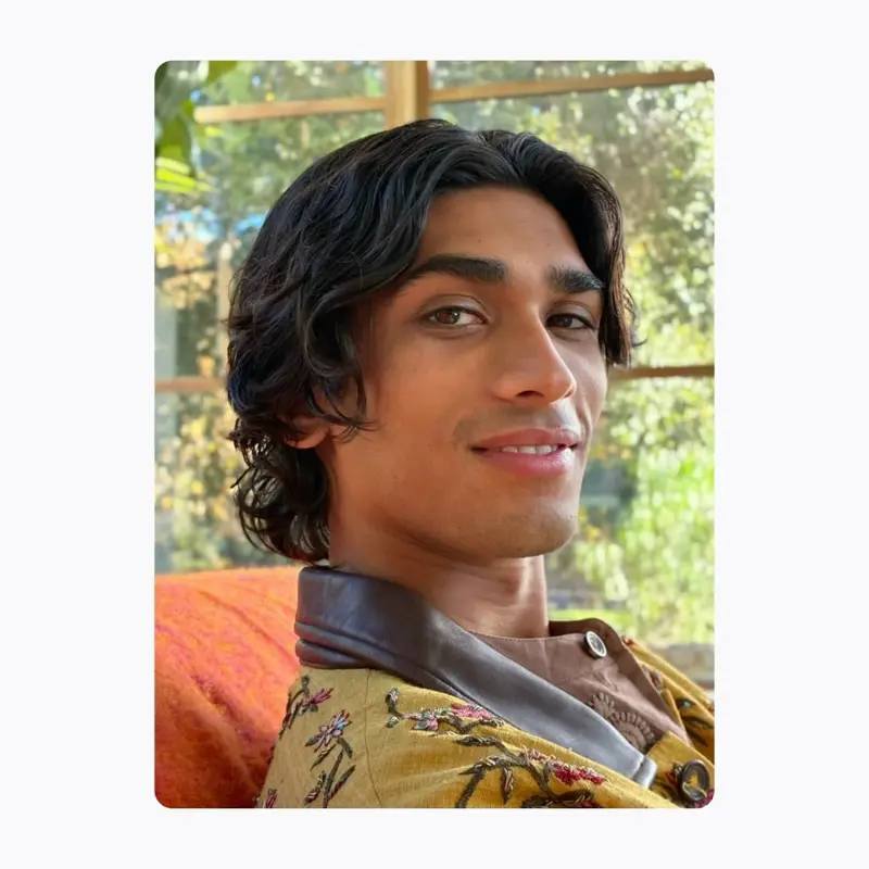 Apple’s official image of the Extend tool in iOS 27 Photos, showing a photo being expanded beyond its original frame on an iPhone